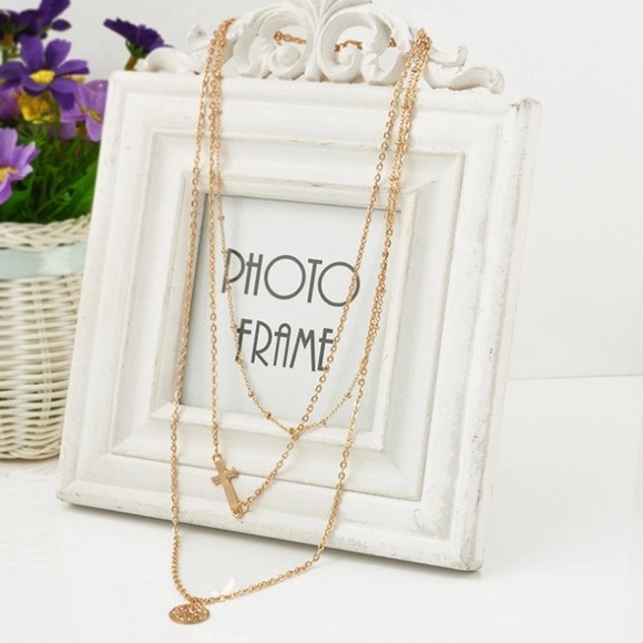 GOLD LAYERED CROSS NECKLACE - Picture 2 of 3